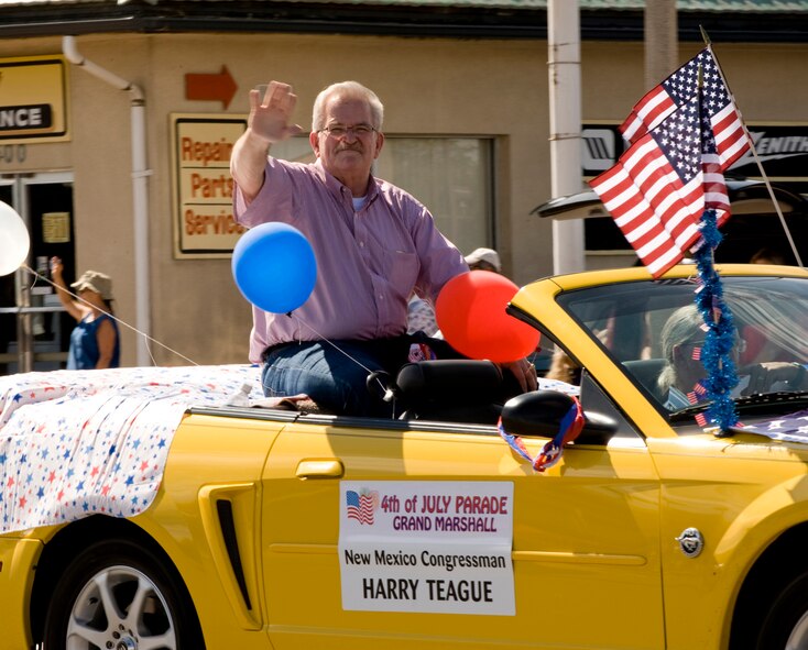 Grand Marshall New Mexico Congressman Harry Teague waves to onlookers during the city of Alamogordo, N.M, 4th of July Parade. (U.S. Air Force Photographer TSgt Alan Port Released)