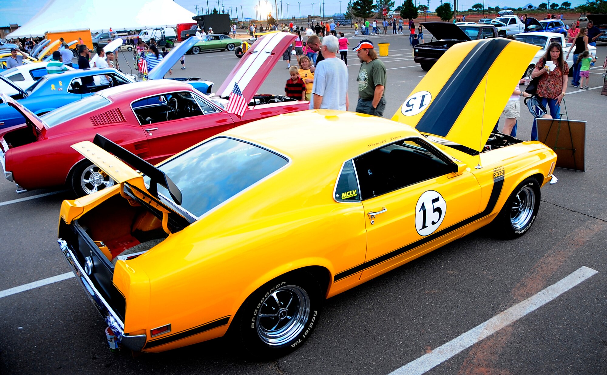 Members of Team Holloman check out the Hot Rods presented at the car show during the Fourth of July Celebration at Holloman Air Force Base, N.M. (U.S. Air Force Photo/Tech.Sgt. Chris Flahive)