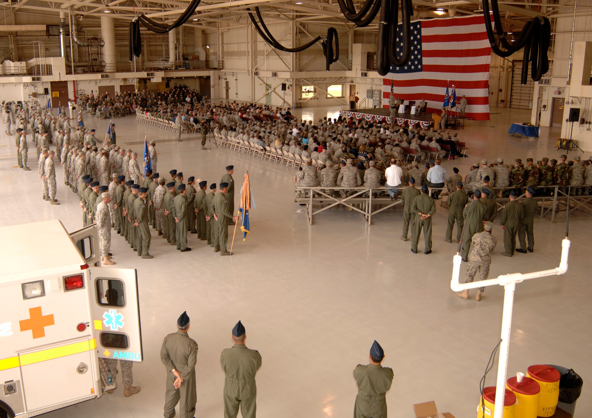 MCCONNELL AIR FORCE BASE, Kan. -- Team McConnell members ready themselves for a welcoming salute to the new 22nd Air Refueling Wing commander, Col. Jamie Crowhurst, during a change of command ceremony held in hangar 1176, July 2. (Photo by Senior Airman Laura Suttles)