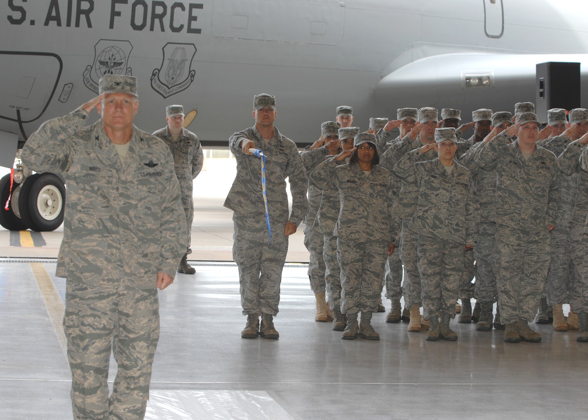 Col. Bart Weiss, 22nd Air Refueling Wing vice commander, leads wing Airmen in a salute to Col. James Crowhurst, 22nd Air Refueling Wing commander, during a change of command ceremony July 2, 2009, McConnell Air Force Base, Kan. (U.S. Air Force photo/Staff Sgt. Jamie Train)