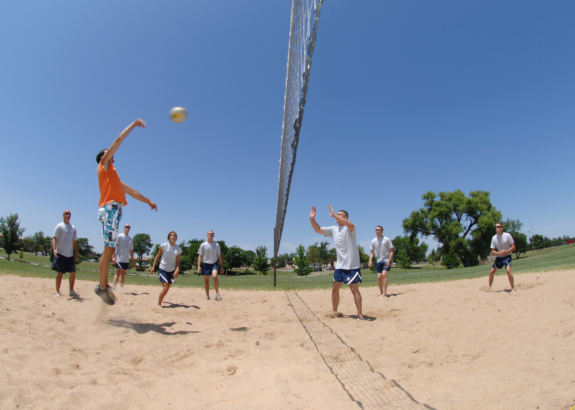MCCONNELL AIR FORCE BASE, Kan. -- Team McConnell members from the 22nd Civil Engineer Squadron and 22nd Security Forces Squadron compete for the overall championship during the Wingman Sports Day held at various locations around base, July 1. (Photo by Staff Sgt. Jamie Train)