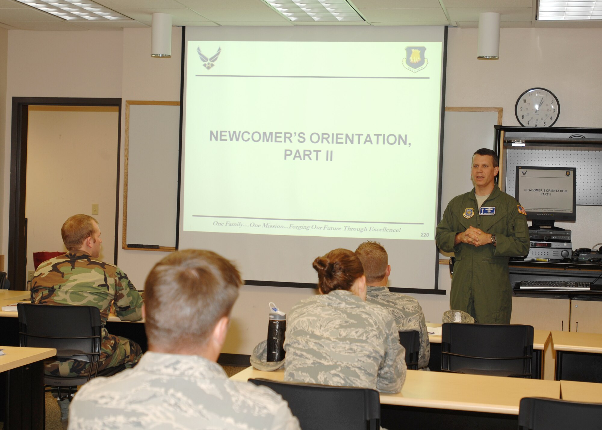 MCCONNELL AIR FORCE BASE, Kan. -- Col. Jamie Crowhurst, 22nd Air Refueling Wing commander, conducts his first newcomer’s briefing as wing commander at the Robert J. Dole Community Center, July 7. This briefing provides new Team McConnell members with information about the base and eases the in-processing procedure. (Photo by Staff Sgt. Jamie Train)