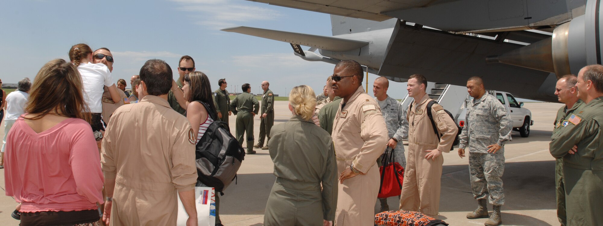 MCCONNELL AIR FORCE BASE, Kan. -- Members of the 18th Air Refueling Squadron return to McConnell Air Force Base, Kan., from a deployment to Al Udeid Air Base, Qatar, July 2. (Photo by Staff Sgt. Jamie Train)