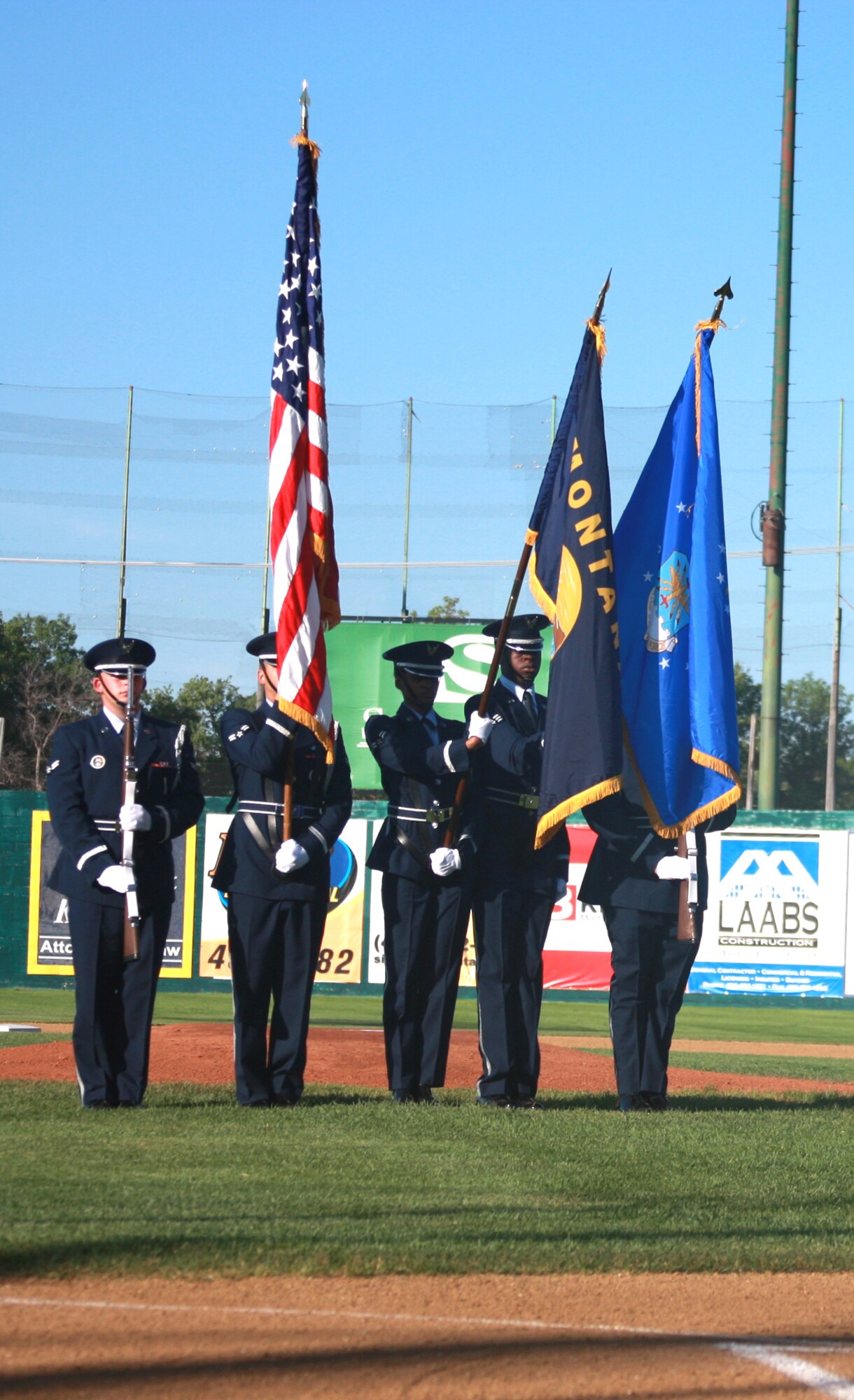 The Malmstrom Honor Guard presents the colors during Military Appreciation Night June 27 at Centene Stadium. (U.S. Air Force photo/Staff Sgt. Marcus McDonald)