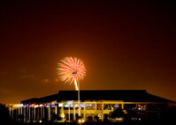 A fireworks extravaganza lights up the sky at Lackland as the 31st annual Star Spangled Festival wraps up at the Amphitheater grounds on July 4. An estimated 25,000 people attended the celebration this year. (U.S. Air Force photo/Robbin Cresswell)