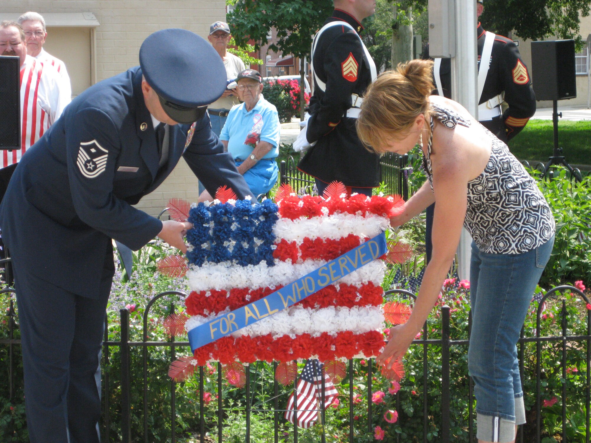 Master Sgt. Walter J. Milewski, first sergeant of the 201st RED HORSE Sq. Det. 1, Willow Grove Air Reserve Stations, Pa. and wife Janice lay a wreath at the Port Richmond Memorial Day Parade in Philadelphia May 25.  Milewski served as Grand Marshall of the parade this year.