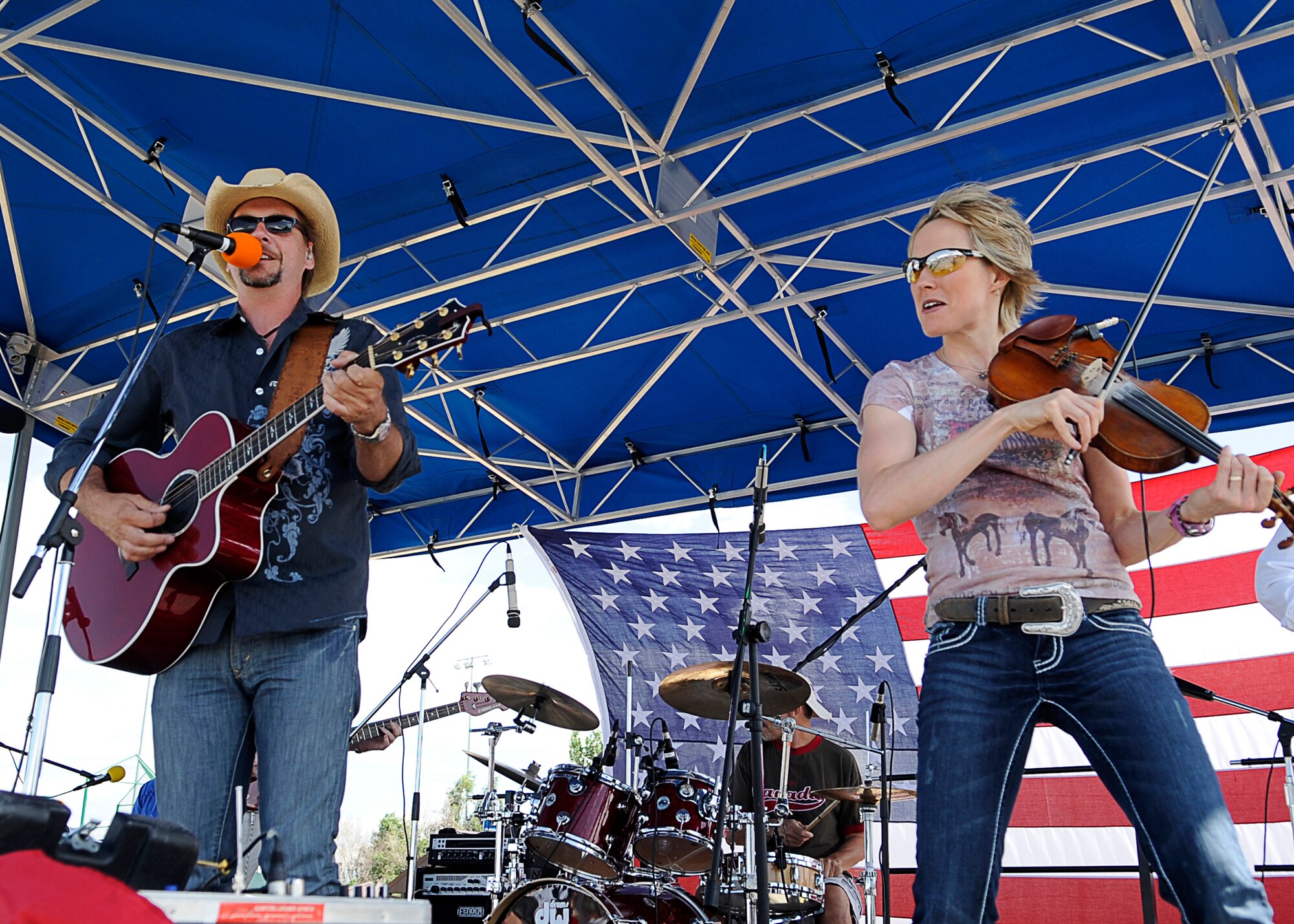 BUCKLEY AIR FORCE BASE, Colo. – Thom Shepherd and the Nashville Song Writers perform during Freedom Fest here, July 1.  The band played vintage and current hits and tunes throughout the festivities including a few songs of their own.  In addition to the live music the celebration included food, events for children and raffle prize giveaways. (U.S. Air Force photo by Tech. Sgt. Jeromy Cross)