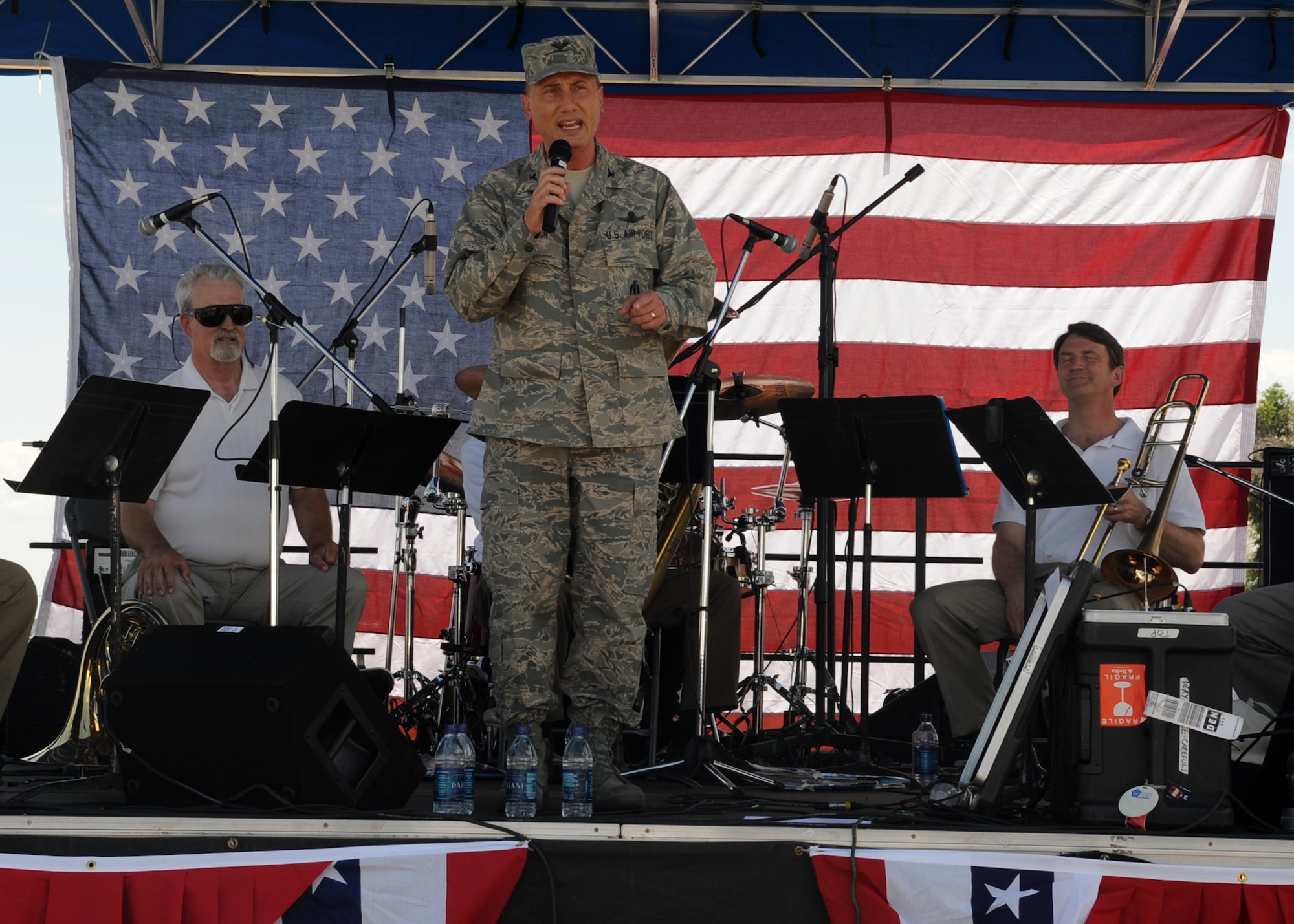 BUCKLEY AIR FORCE BASE, Colo. – Col. Clint Crosier, 460th Space Wing commander, kicks off Freedom Fest here, July 1.  The festivities provided armed forces members and their families various foods, events for children, raffle prize giveaways and live music.  (U.S. Air Force photo by Senior Airman Randi Flaugh)