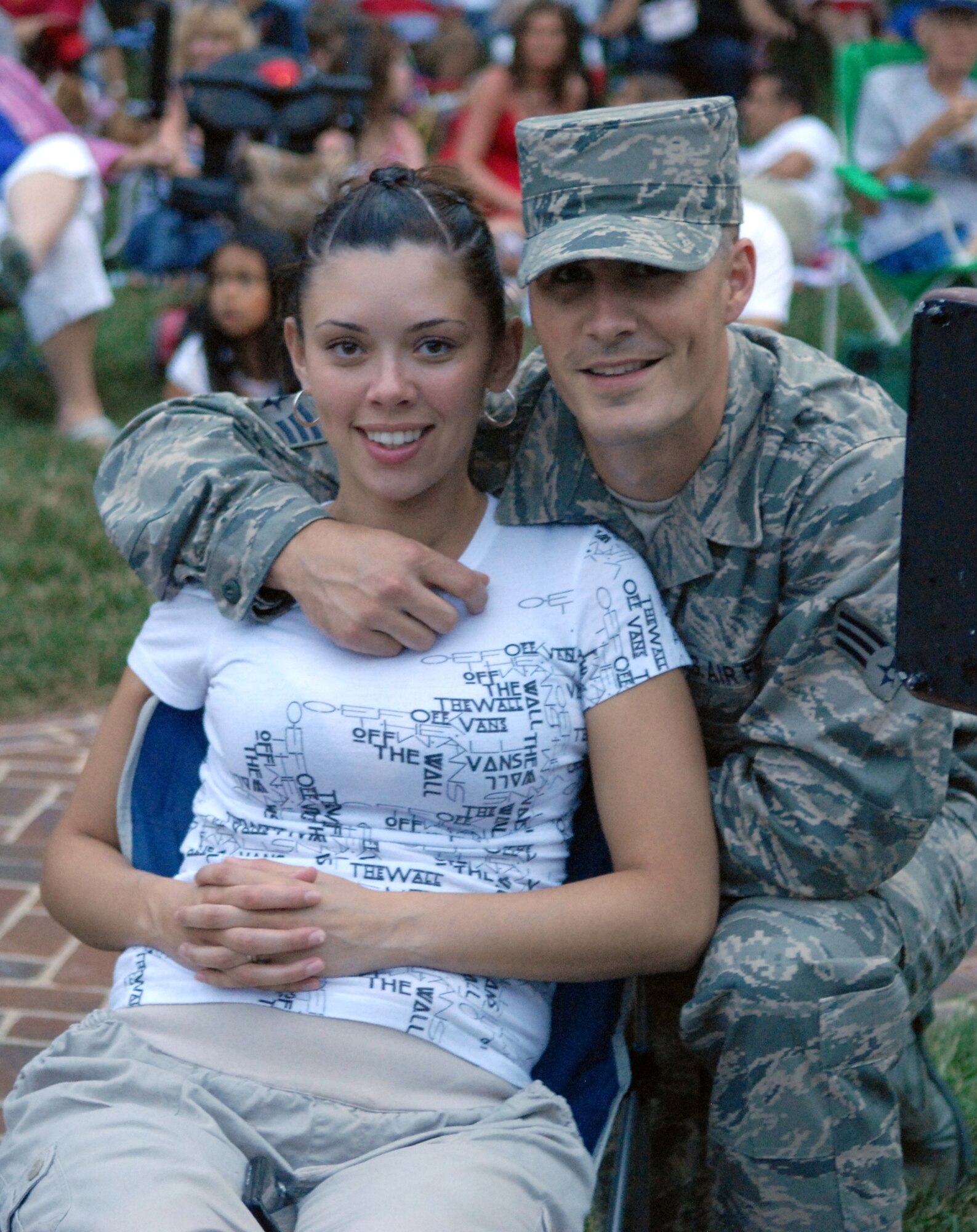 Anna and Senior Airman Nick Cross await the start of the firework display in Downtown Dover July 4. The couple was among many base Airmen and family members out enjoying the day?s festivities. (U.S. Air Force photo/Tech. Sgt. Kevin Wallace)