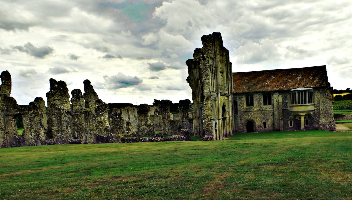 Castle Acre Priory sits ruined on a cloudy English day > Royal Air