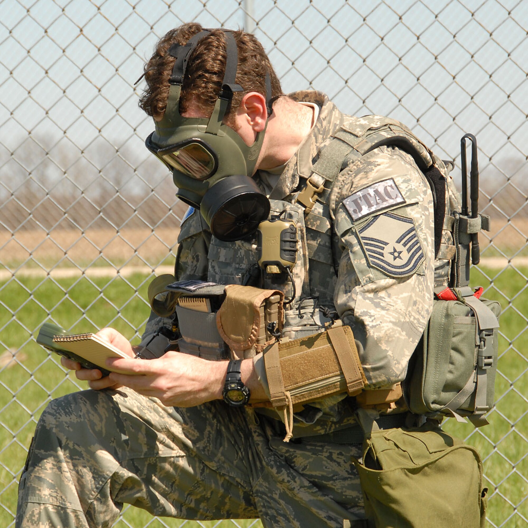 MSgt Edward Shulman, 113th ASOS, stops at observaction point during an exercise to prepare data to transmit.  Photo by Michael Kellams