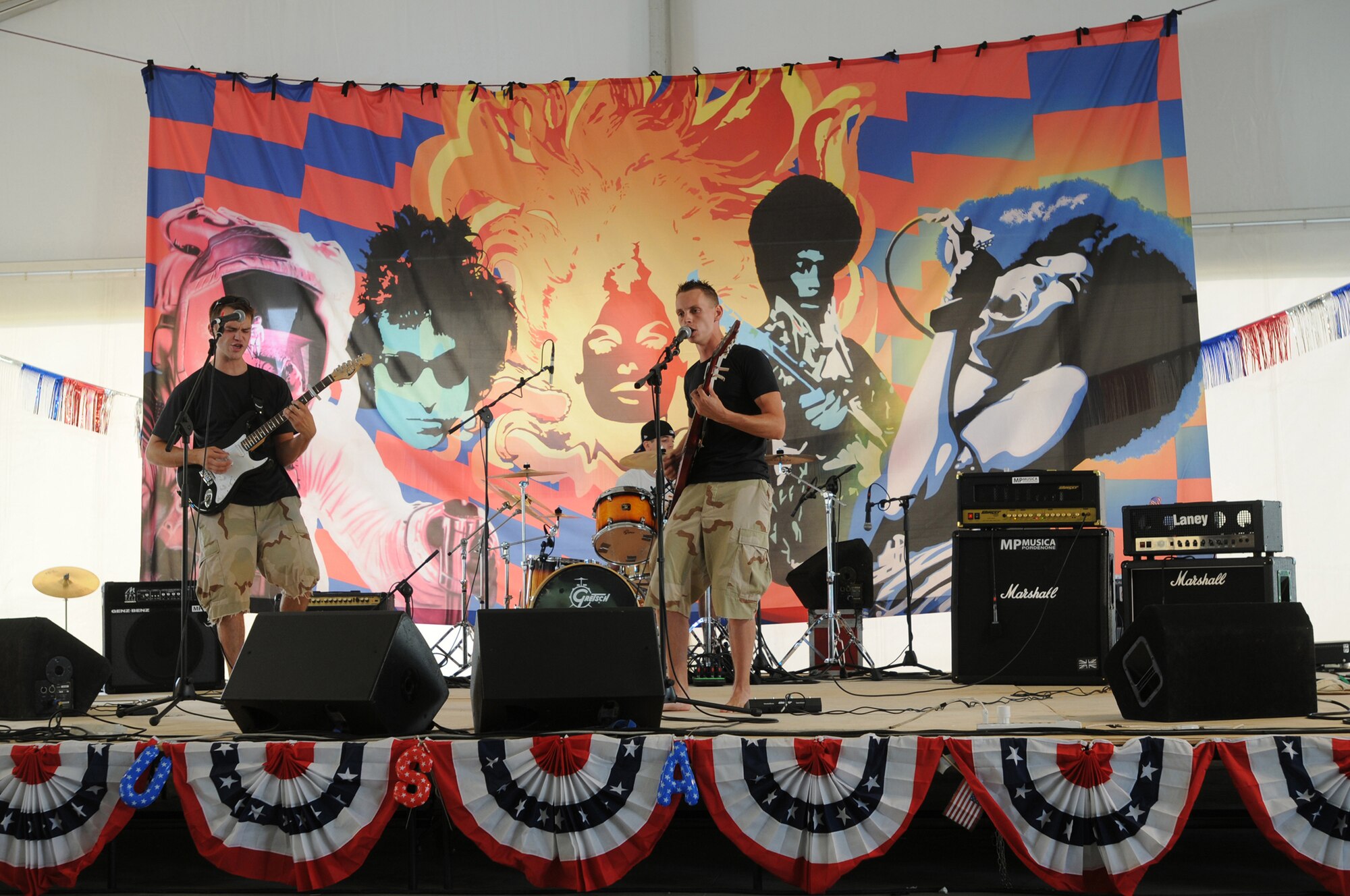The band Urban Dirt Road, consisting of members from the 31st Maintenance Squadron, plays during the battle of the bands event here during the 4th of July Celebration.  The festivities consisted of various events throughout the day and concluded with a fireworks display at night commemorating 233 years of Independence. (U.S. Air Force photo/ Staff Sgt. Patrick Dixon)