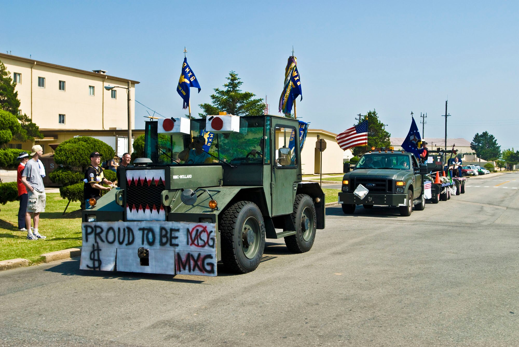 KUNSAN AIR BASE, Republic of Korea -- The 8th Maintenance Group's float rolls down the street for all onlookers July 4 during the annual parade. The Wolf Pack celebrated the 4th of July with a parade, cardboard boat race, and other assorted activities. (U.S. Air Force photo by Senior Airman Jonathan Steffen)