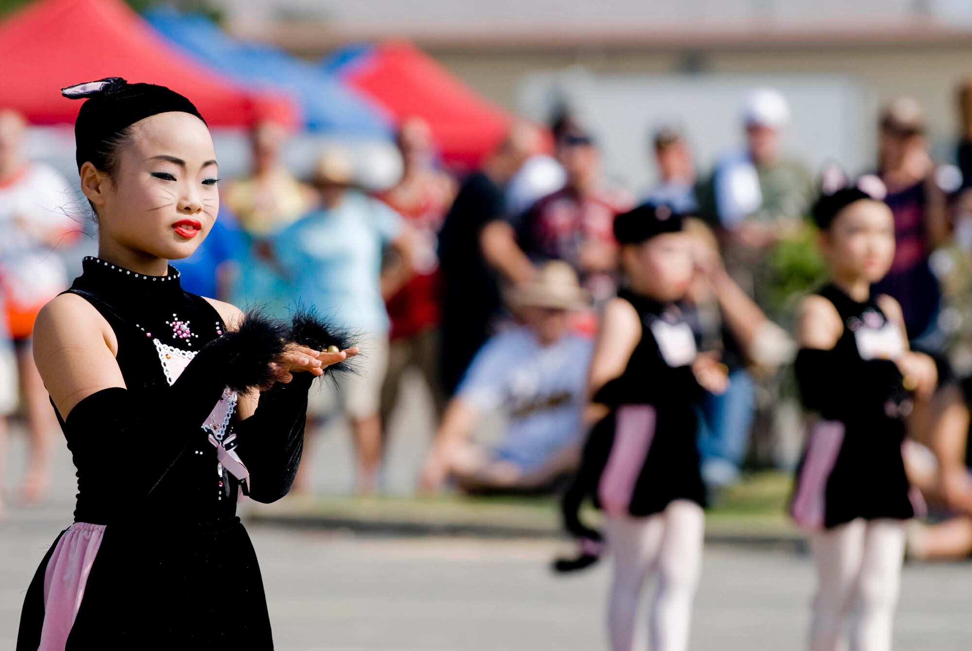 KUNSAN AIR BASE, Republic of Korea -- Korean dancers perform for the Wolf Pack July 4th during the annual extravaganza. Kunsan celebrated the 4th of July with an annual parade, cardboard boat race, and other assorted activities throughout base. (U.S. Air Force photo by Senior Airman Jonathan Steffen)