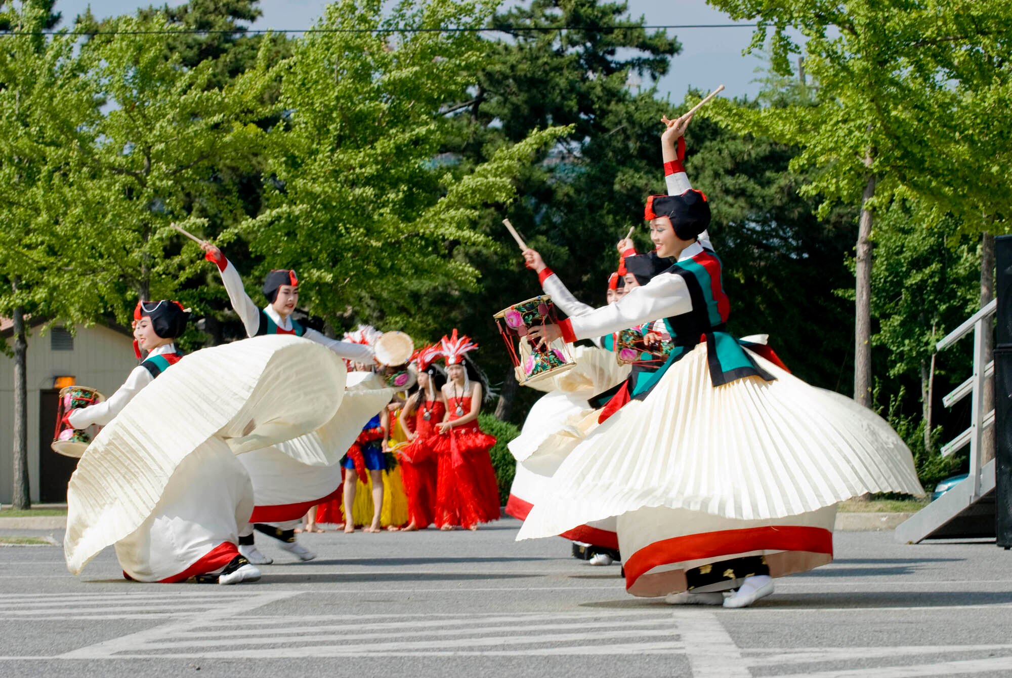 KUNSAN AIR BASE, Republic of Korea -- Korean dancers perform for the Wolf Pack July 4 during the annual extravaganza. Kunsan celebrated the 4th of July with an annual parade, cardboard boat race, and other assorted activities throughout the base. (U.S. Air Force photo by Senior Airman Jonathan Steffen)