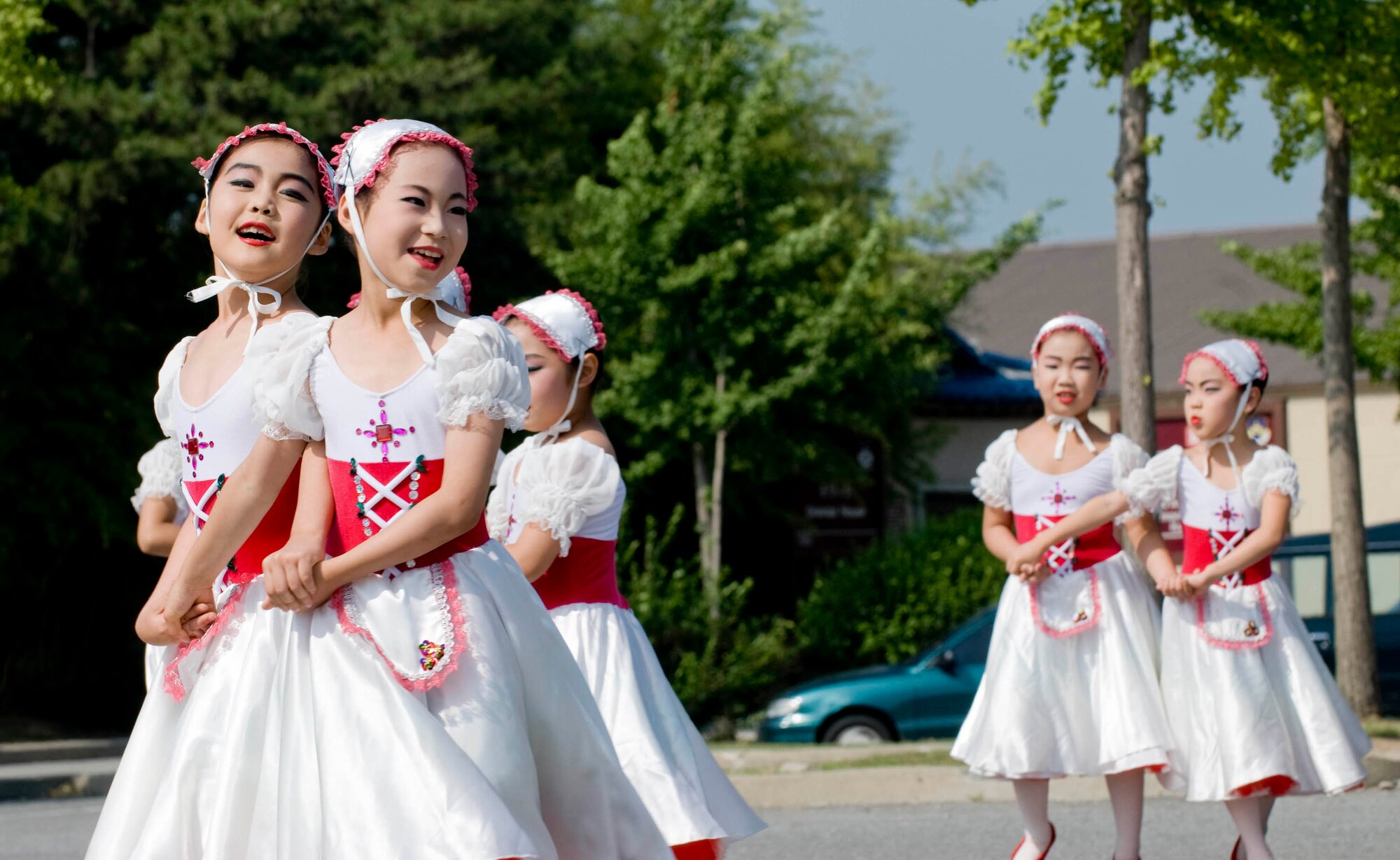 KUNSAN AIR BASE, Republic of Korea -- Korean dancers perform for Wolf Pack members July 4th during the annual Extravaganza. Kunsan celebrated the 4th of July with an annual parade, cardboard boat race, and other assorted activities throughout the day. (U.S. Air Force photo by Senior Airman Jonathan Steffen)