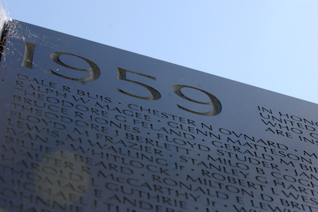 The name of U.S. Army Master Sgt. Chester Ovnand and Maj. Dale Buis are incribed on Panel 1 E of the Vietnam War Memorial Wall. They were the first two U.S. servicemembers killed in the Vietnam War, and their sacrifice was honored in Washington, D.C., July 8, 2009, in a ceremony commemorating the 50th Anniversary of their deaths.
