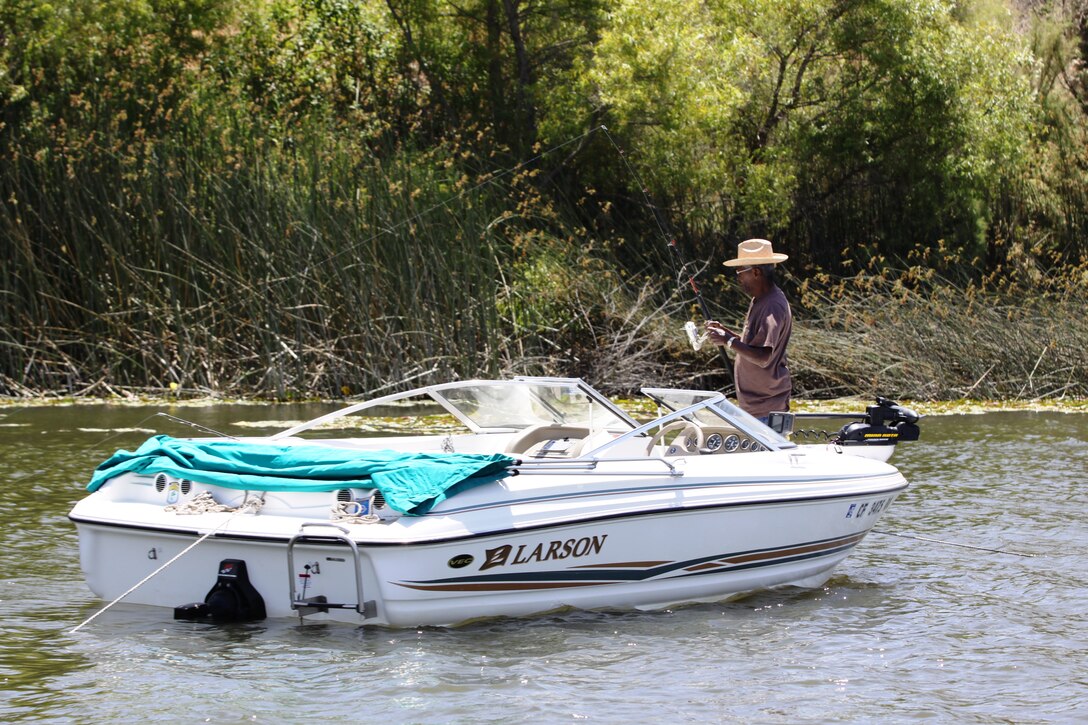 Ernest F. Porter, 52-year base fisherman and retired gunnery sergeant is seen here fishing at Lake O’Neill on Camp Pendleton, July 8. Porter holds the base’s recent record for the largest catfish caught at 22 pounds.