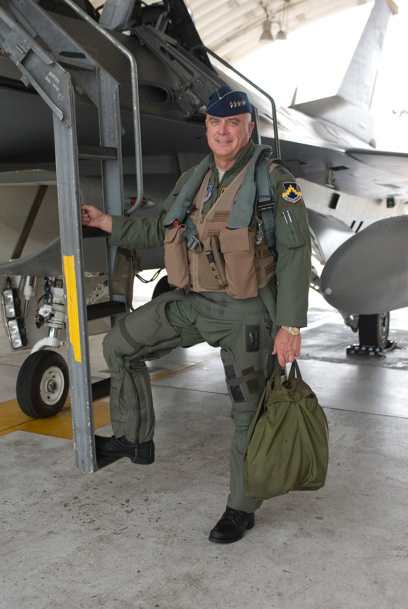 Gen. Howie Chandler, Commander, Pacific Air Forces, stands next to an F-16 
Fighting Falcon assigned to Kunsan Air Base, Republic of Korea, before his 
familiarization flight with the Wolf Pack June 30.
