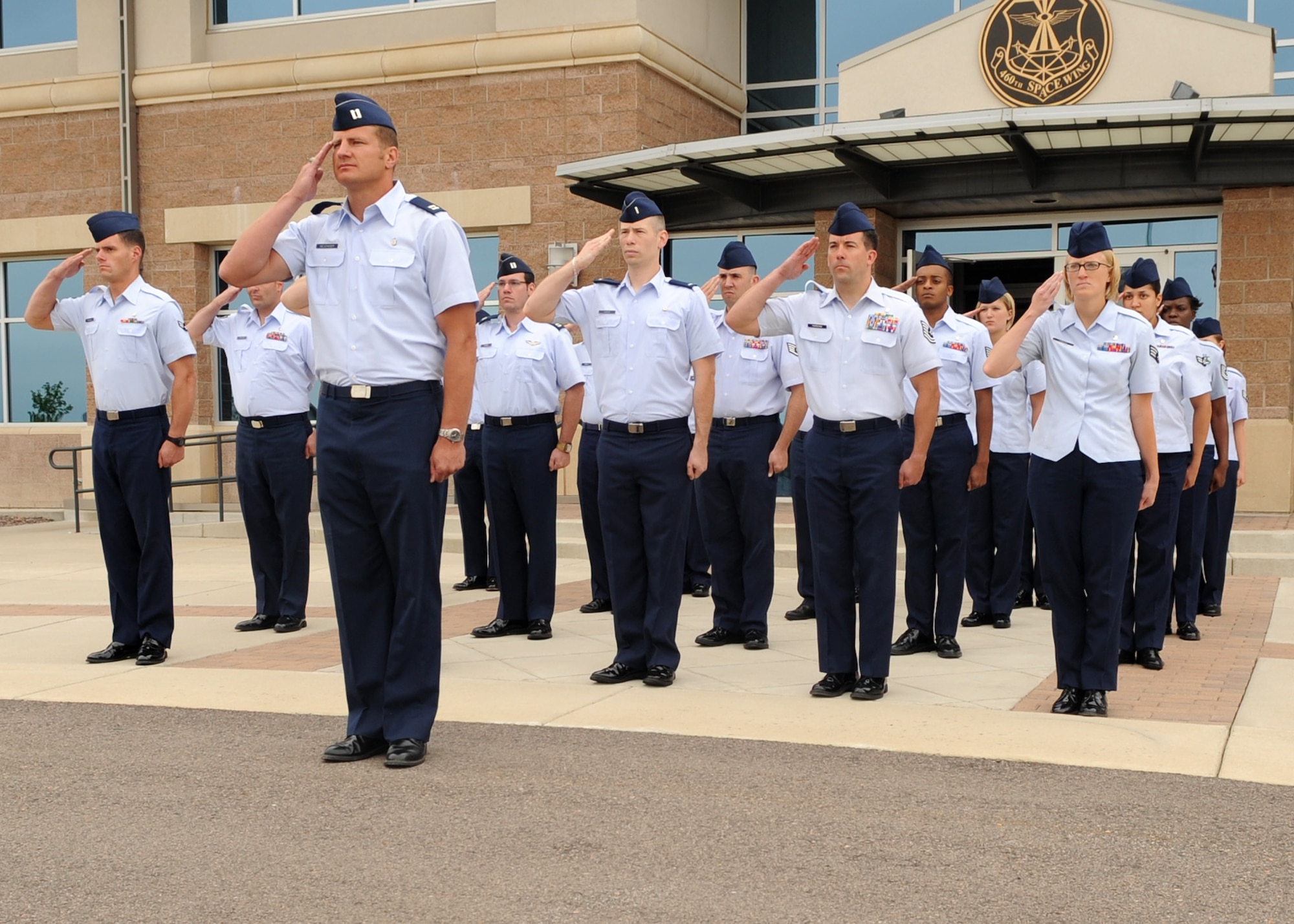 BUCKLEY AIR FORCE BASE, Colo. – 460th Medical Operations Squadron members render a first salute to new commander Lt. Col. James Jablonski after he assumed command of the squadron from Lt. Col. Jerry Lawson during an official ceremony here July 9. (U.S. Air Force photo by Senior Airman Randi Flaugh)
 
