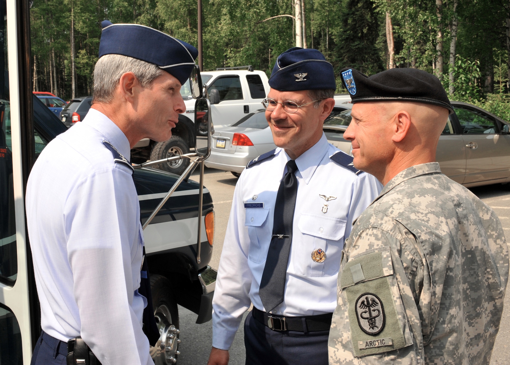 Air Force Chief of Staff Gen. Norton Schwartz is greeted by Col. Paul Friedrichs, 3rd Medical Group commander, and Army Col. Ron Stephens, Basset Army Community Hospital, July 6 during his visit to Elmendorf Air Force Base, Alaska. (U.S. Air Force photo/Senior Airman Laura Turner)