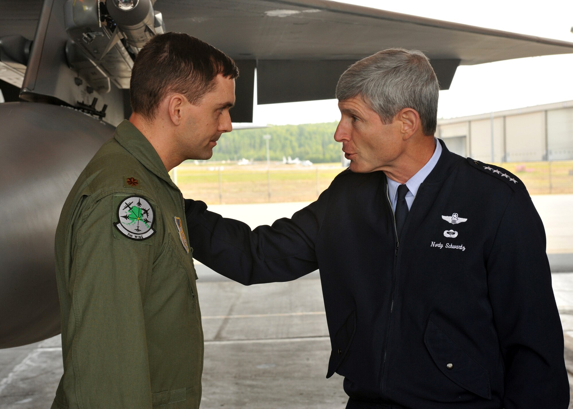 Air Force Chief of Staff Gen. Norton Schwartz thanks Maj. Christopher Ridlon, chief of the 3rd Operations Group, for showing him around the combat alert cell July 6 during his visit to Elmendorf Air Force Base, Alaska. (U.S. Air Force photo/Senior Airman Laura Turner)