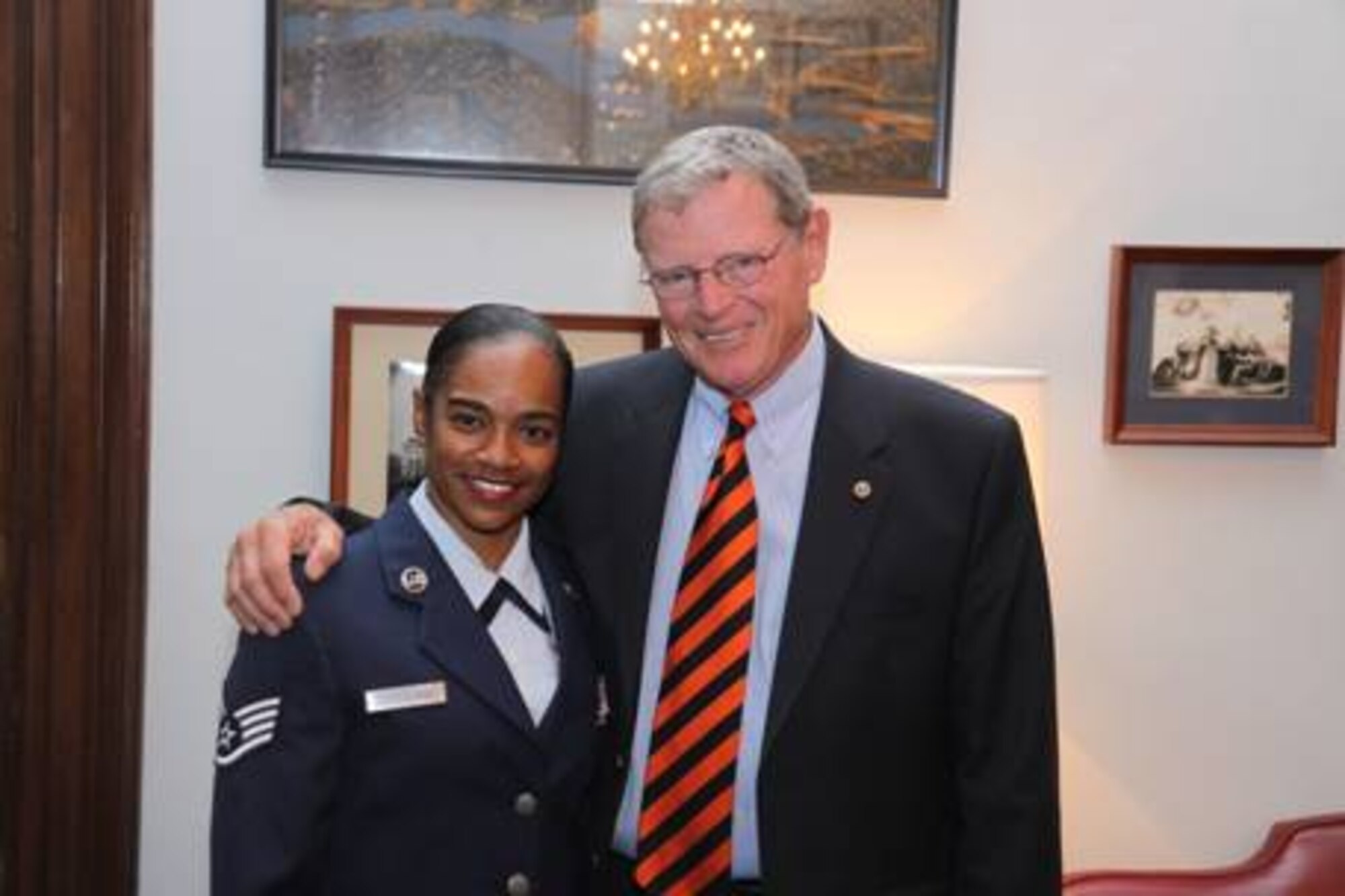 ALTUS AIR FORCE BASE, Okla. -- U.S. Sen. Jim Inhofe (R-Okla.), a senior member of the Senate Armed Services Committee, praises Staff Sgt. Mercedes Kimble Crossland, formerly of the 97th Air Mobility Wing at Altus Air Force Base, Okla. for being named the Air Force Times’ 2009 Airman of the Year. (Courtesy photo) 