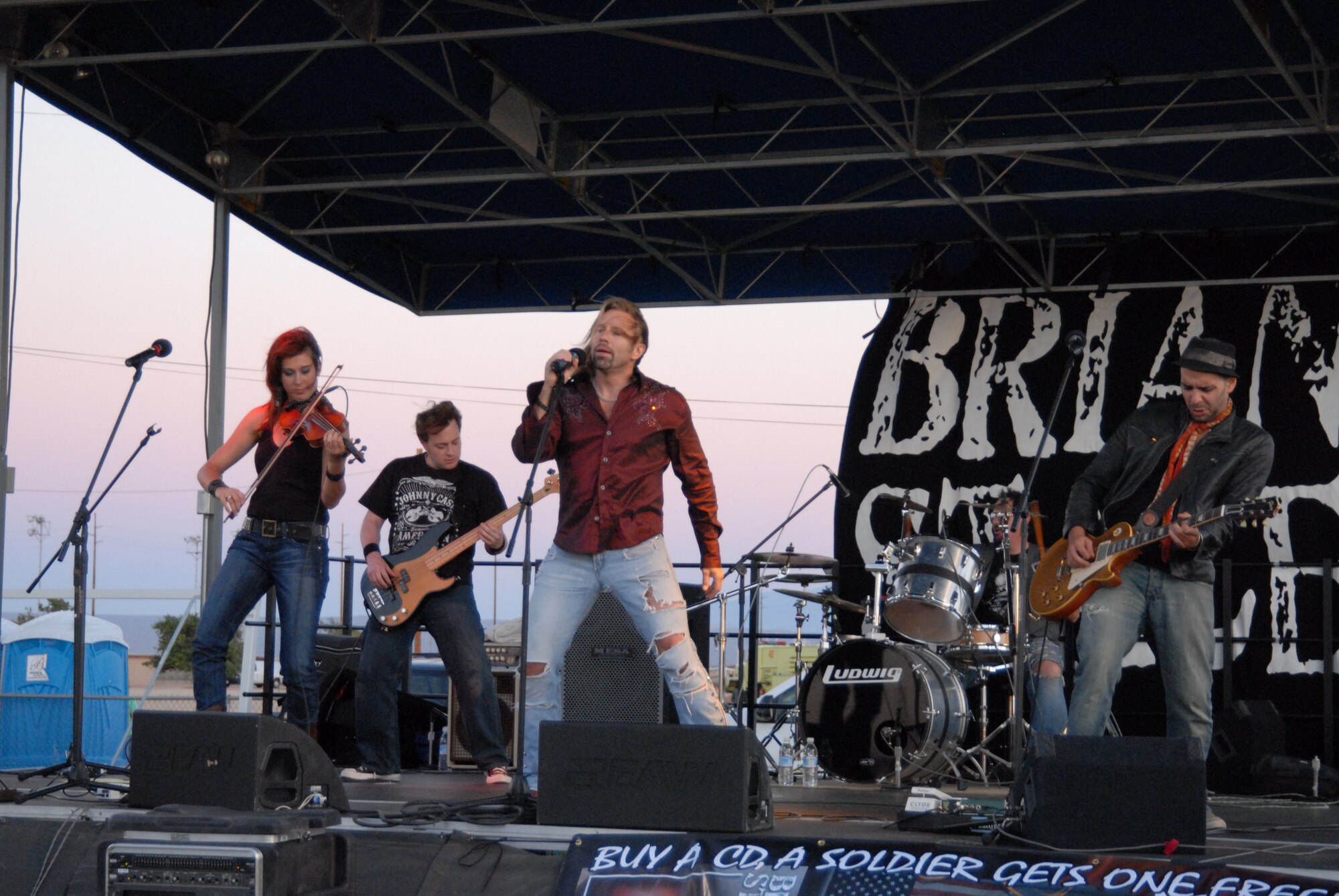 The band performs during the  Annual Summer Bash at Robert and Wings Field July 4. The Summer Bash featured carnival rides, music, food, drinks, games and fireworks. (Air Force photo by Airman 1st Class William O'Brien)  