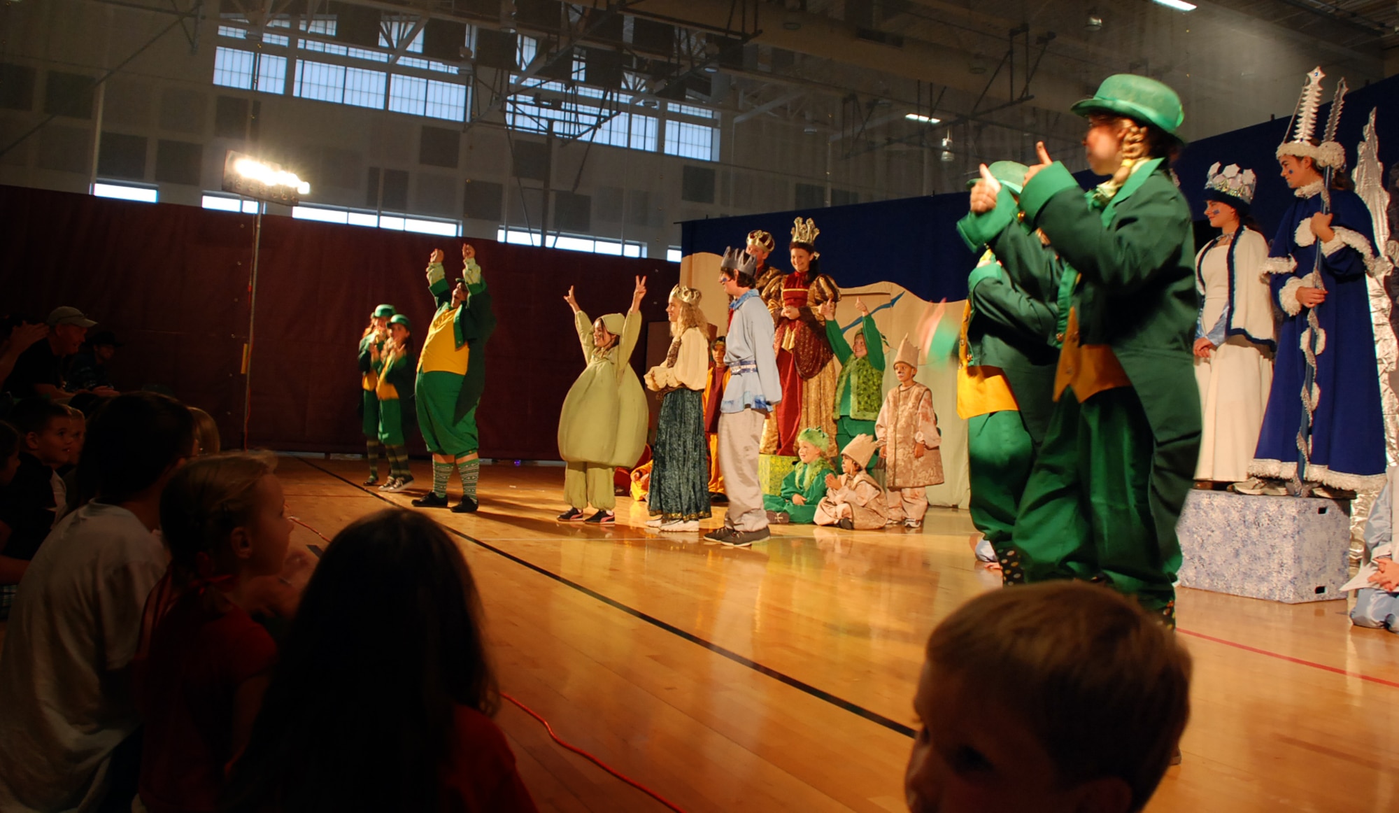 LAUGHLIN AIR FORCE BASE, Texas –– A group of more than 40 young Laughlin members steal the stage during a performance of “The Princess and the Pea” at Losano Fitness Center here June 26. The play was the final product after the young XLers went through weeks of auditioning, casting and practicing with members of the Missoula Children’s Theatre. (U.S. Air Force photo by Airman 1st Class Sara Csurilla)
