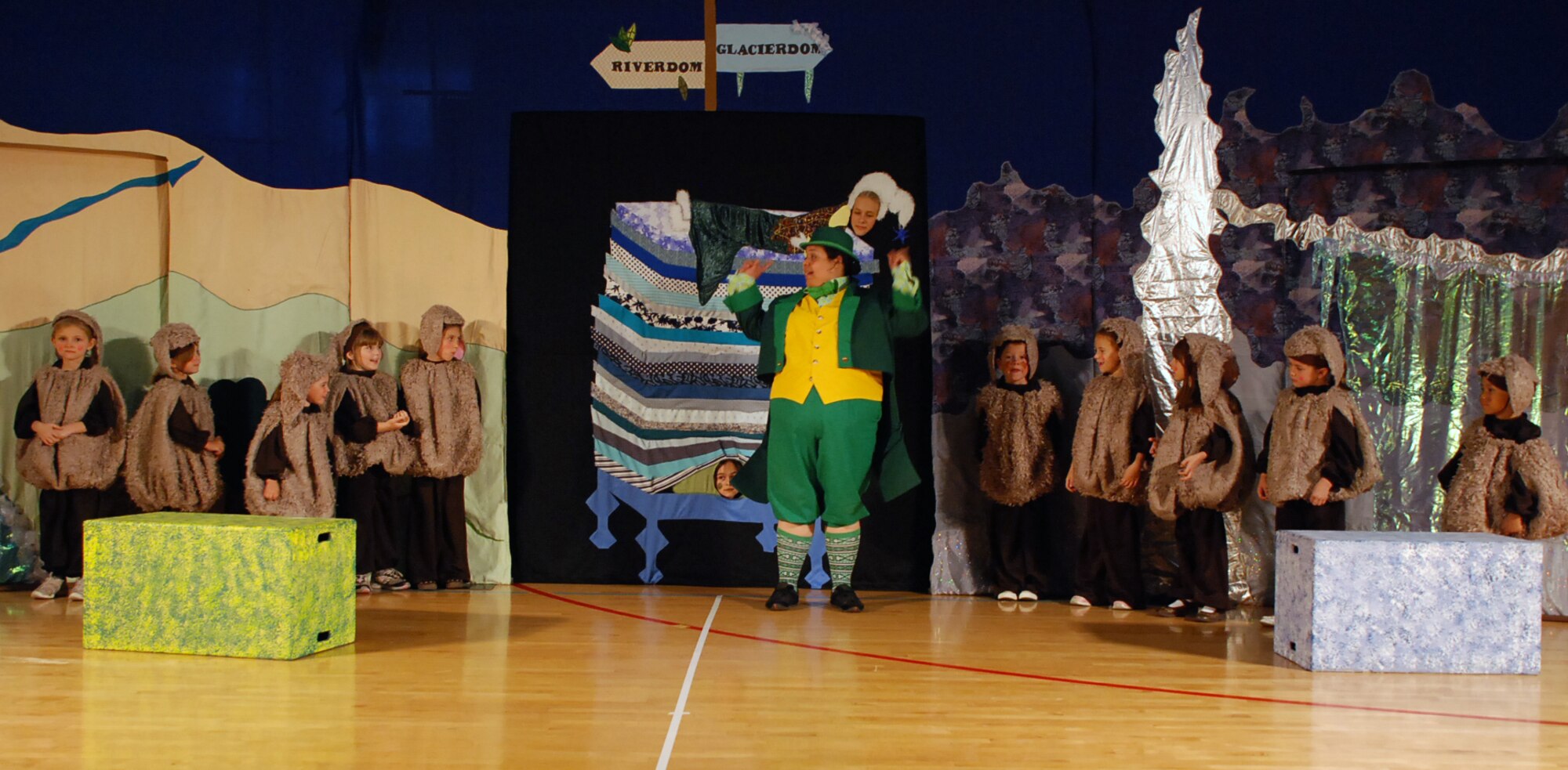 LAUGHLIN AIR FORCE BASE, Texas –– A group of more than 40 young Laughlin members steal the stage during a performance of “The Princess and the Pea” at Losano Fitness Center here June 26. The play was the final product after the young XLers went through weeks of auditioning, casting and practicing with members of the Missoula Children’s Theatre. (U.S. Air Force photo by Airman 1st Class Sara Csurilla)