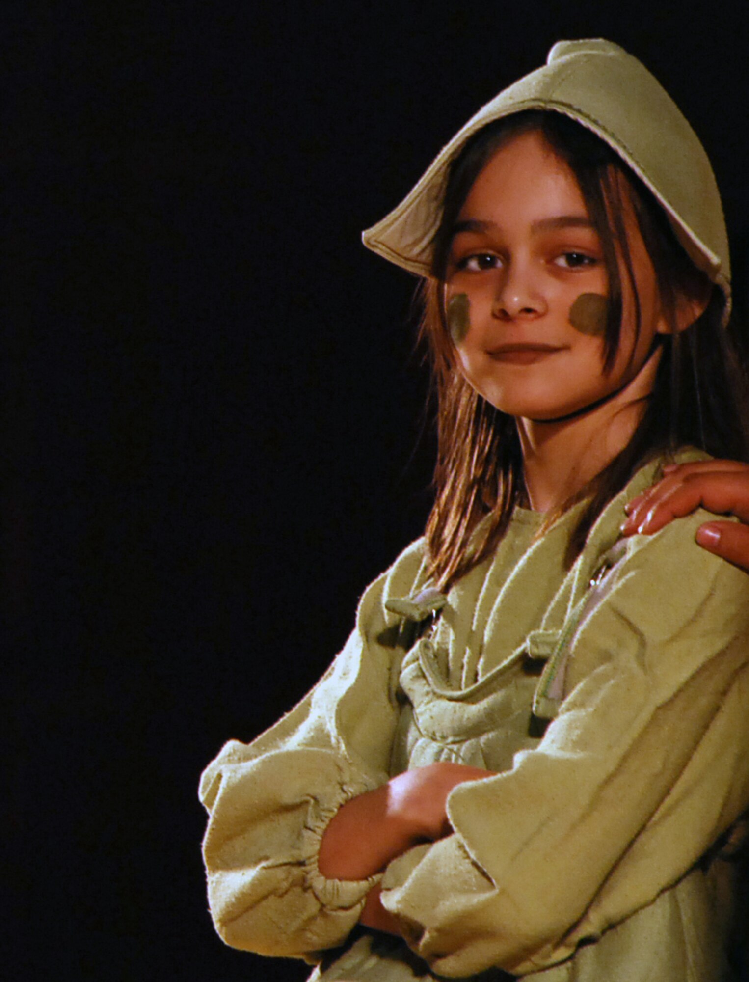 LAUGHLIN AIR FORCE BASE, Texas –– Sabrina Shrum,11, daughter of Tanya and Maj. Rory Shrum, 96th Flying Training Squadron, plays the Pea during a performance of “The Princess and the Pea” at Losano Fitness Center here June 26. The play was the final product after the young XLers went through weeks of auditioning, casting and practicing with members of the Missoula Children’s Theatre. (U.S. Air Force photo by Airman 1st Class Sara Csurilla)