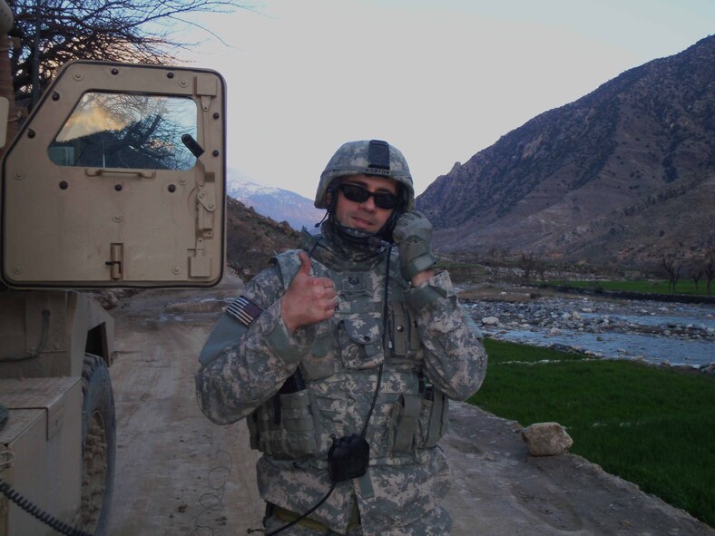 Tech. Sgt. Benjamin Horton, 775th Civil Engineer Squadron Explosive Ordinance Disposal technician, stands near the Senji Bridge in North Afghanistan,Konar Province where he cleared improvised explosive devices as part of his mission.