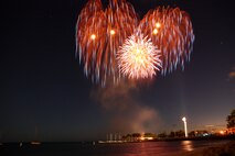 HICKAM AIR FORCE BASE, Hawaii -- Fireworks explode over Hickam Harbor during the grand finale of the All American Beach Blast July 4. The All American Beach Blast, hosted by 15th Services Squadron, began with camping and a movie under the stars July 3. The celebration continued July 4 with food booths, live entertainment, a kiddieland play area, bounce houses, swimming, as well as powerboat, sailboat and banana boat rides in the harbor. (U.S. Air Force photo/Staff Sgt. Mike Meares)