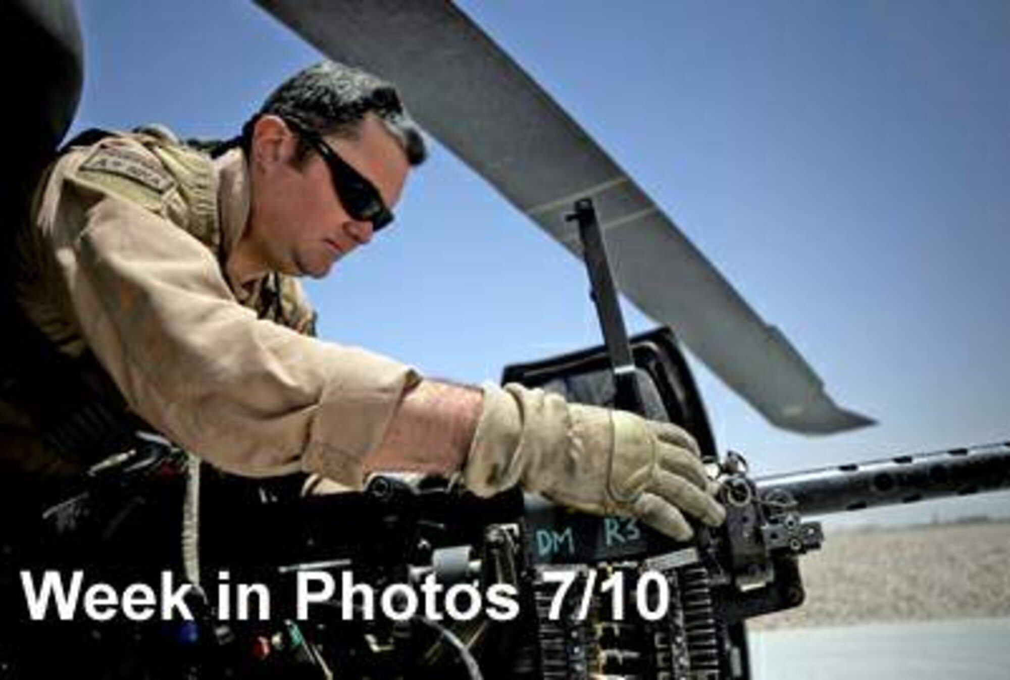 Air Force Week in Photos for July 10 highlights photos from around the Air Force. In this photo by Staff Sgt. Shawn Weismiller, Tech. Sgt. Brock Woodward performs a preflight inspection of a .50-caliber machine gun at Camp Bastion, Afghanistan.   (U.S. Air Force illustration)



