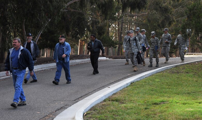 VANDENBERG AIR FORCE BASE, Calif.--Members of Building 12000 evacuate due to an earthquake July 9. The simulated earthquake was part of the foggy shores exercise. The exercise is used to prepare for real world emergencies. (U.S. Air Force Photo/Senior Airman Stephanie Longoria)
