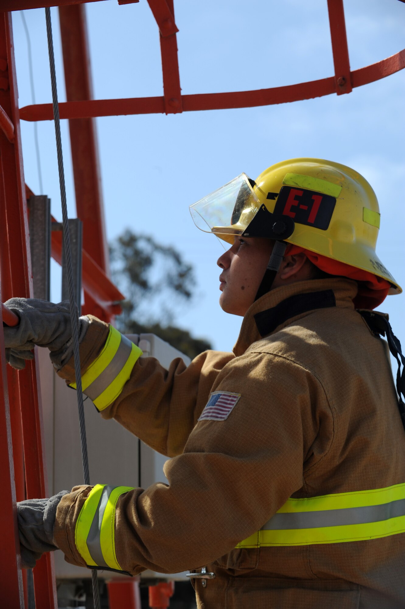 VANDENBERG AIR FORCE BASE, Calif.-- Senior Airman Erik Zimmerman responds to a simulated unconscious person hanging from an airfield beacon support tower July 9. The simulation was part of a base excercise that tested and prepared Airmen for real life emergencies. (U.S. Air Force Photo/Senior Airman Stephanie Longoria)
