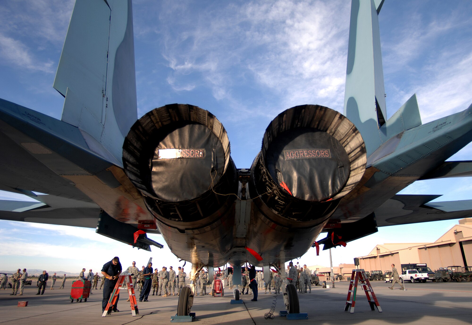 Airman from the 57th Aircraft Maintenance Squadron, Eagle AMU conduct pre-load checks during the weapons load competition at Nellis Air Force Base, Nev., on July 8, 2009. Weapons load competitions are conducted bi-monthly to keep Airman sharp while recognizing a job well done.  Weapons Load Crews are evaluated for use of the checklist, safety, and overall speed.  (U.S. Air Force Photo/Tech. Sgt. Michael R. Holzworth)
