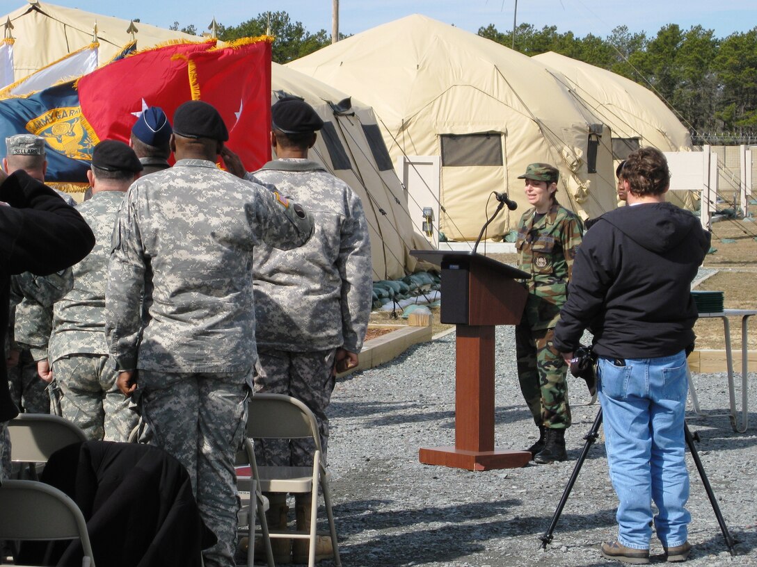 SSgt Ruth Petkaitis sings the National Anthem during opening ceremonies of the Massachusetts Army National Guard's Year of the NCO competition at Tactical Training Base Kelly, Massachusetts Military Reservation, MA. (MA ANG Photo/MSgt Charles Edgerly)
