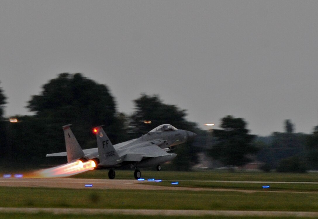 LANGLEY AIR FORCE BASE Va. -- An F-15 Eagle takes off here July 7. This flight is a part of night flying operations training exercises being held July 7-9. (U.S. Air Force photo/Airman 1st Class Jonathan Koob) 