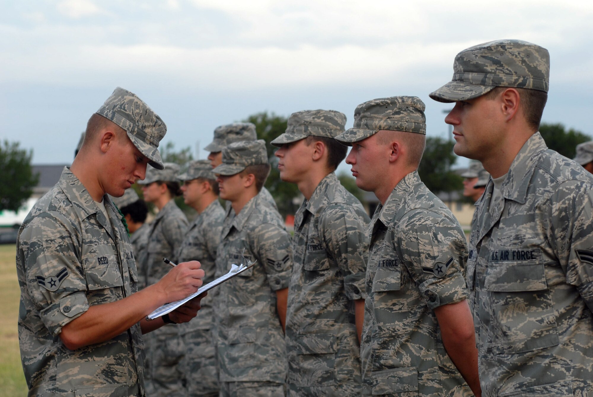 Airman 1st Class Corey Reed, a 315th Training Squadron student, performs open ranks inspections during morning formation. (U.S. Air Force photo by Staff Sgt. Laura R. McFarlane)