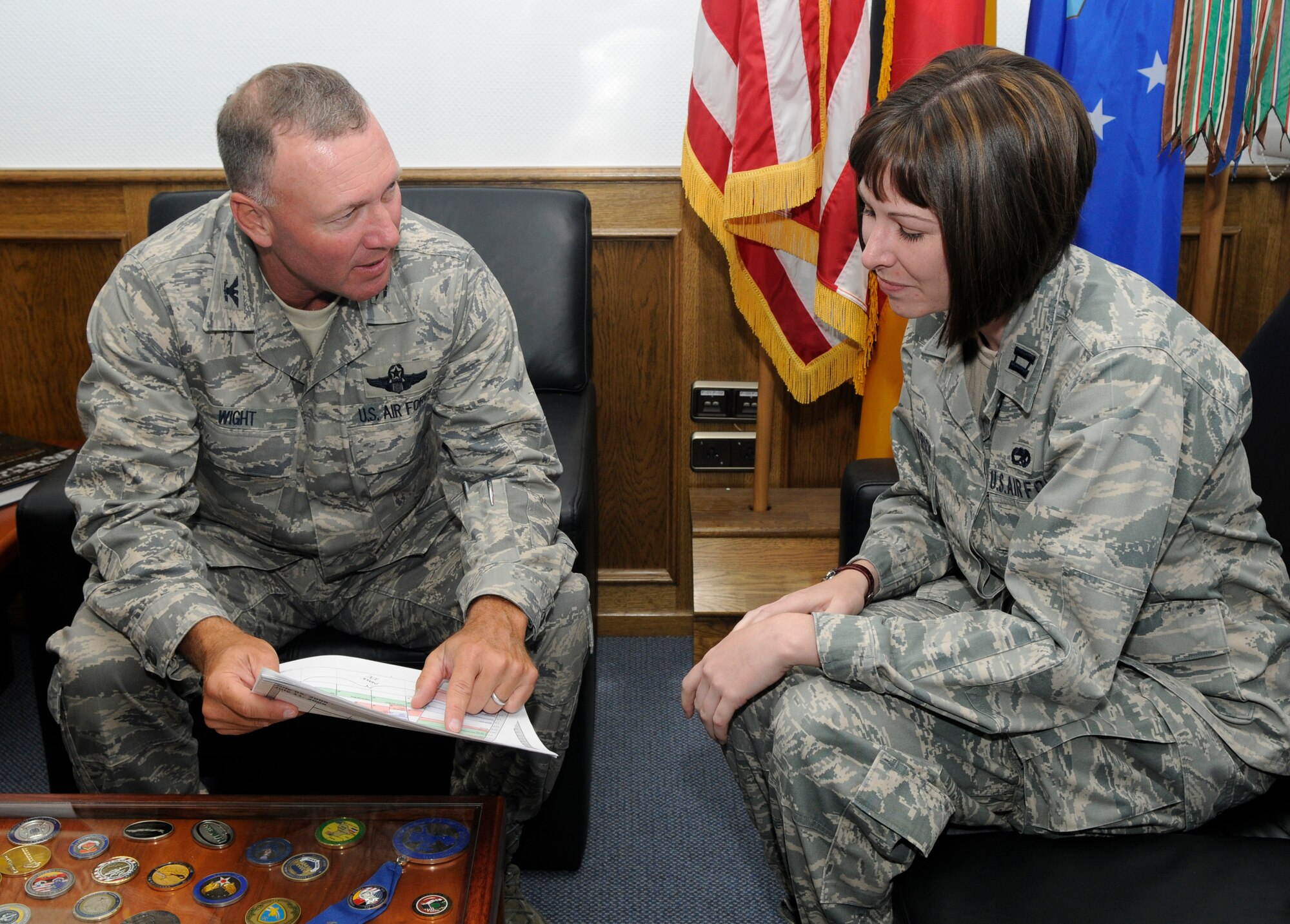 SPANGDAHLEM, Germany – Capt. Kathleen Fitzpatrick, 52nd Component Maintenance Squadron propulsion flight commander, meets with Col. Tip Wight, 52nd Fighter Wing commander, as part of the commander’s shadow program July 8. (U.S. Air Force photo by Airman 1st Class Staci Miller)