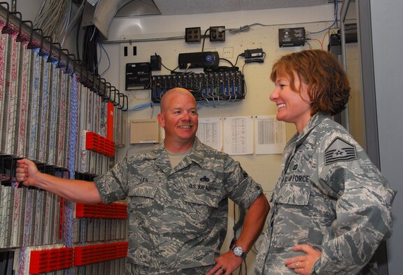 Tech. Sgt. Michael A. Lien, 115th Communications Squadron noncommissioned officer in charge of voice networks, and Tech. Sgt. Tracy L. Lien, a communications-computer systems planning and implementation management specialist also with the 115 CS, are promoted to master sergeant June 27. Together they have 32 years of military experience and five years of marriage. They reside in Mazomanie, WI. (U.S. Air Force Photo by Airman 1st Class Ryan Roth) 