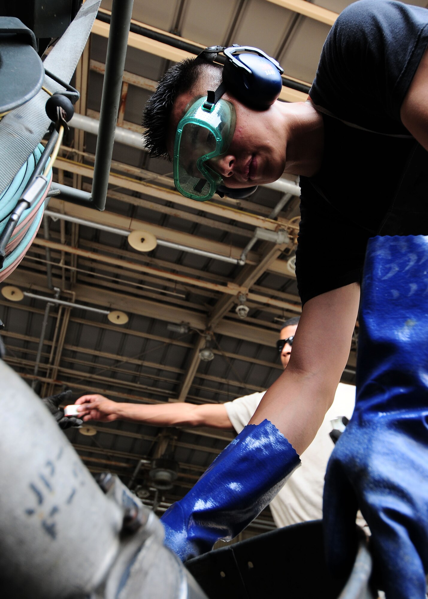 YOKOTA AIR BASE, Japan – Senior Airman Edward Au, 374th Logistics Readiness Squadron Fuels Management Flight, pumps fuel from an R-14, a piece of fuels mobility support equipment, to a fuel bladder recently. Airmen use the R-14 to pump fuel from a fuel bladder or tank to another source such as an aircraft or fuel truck. (U.S. Air Force photo/Airman 1st Class Michael Dillon)