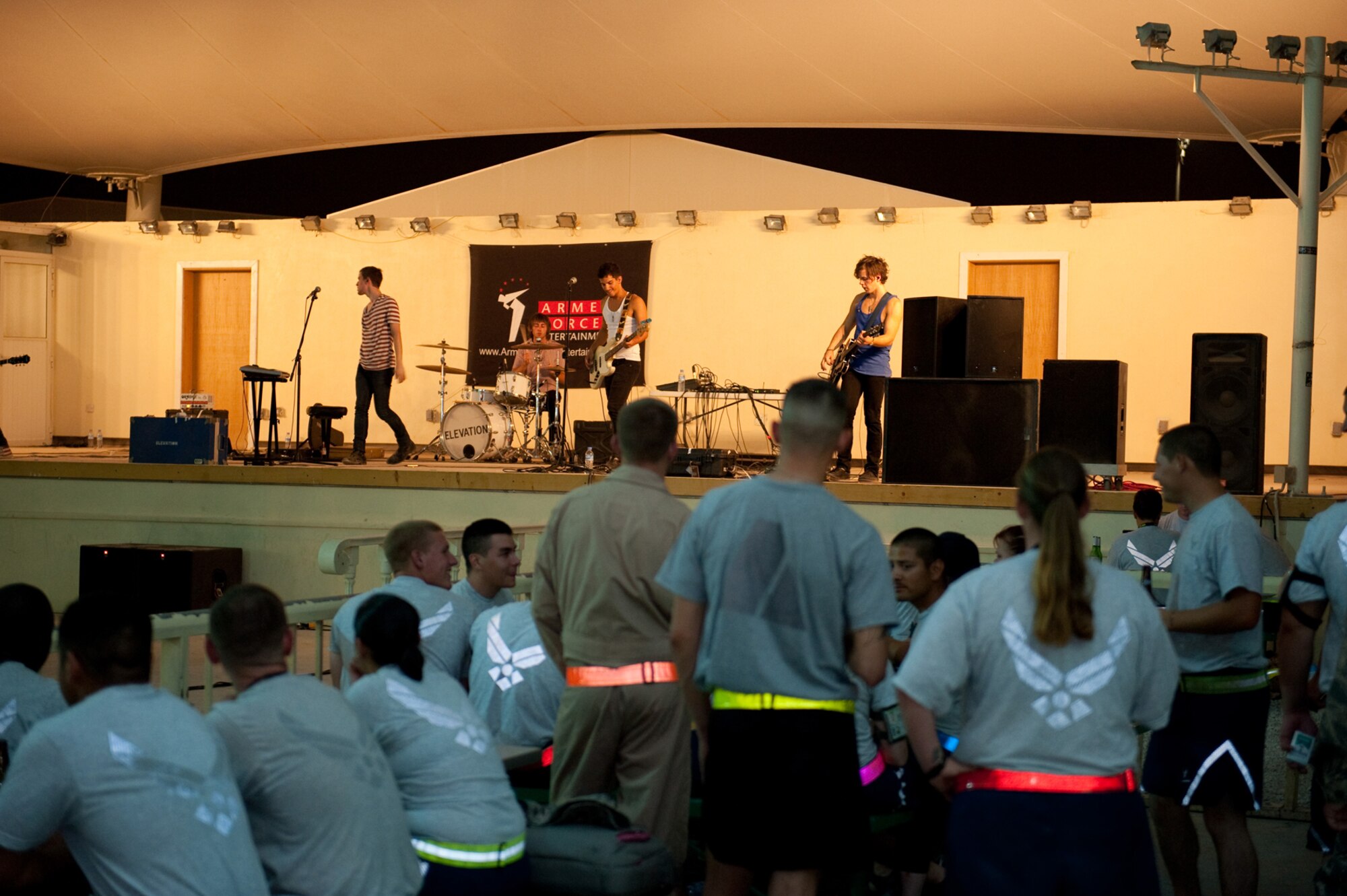 Members of the band Elevation, an Atlanta-based group, perform at the 379th Air Expeditionary Wing's Memorial Plaza, July 7, as part of an Armed Forces Entertainment-sponsored event for deployed U.S. and Coalition forces. (U.S. Air Force photo/ Staff Sgt. Robert Barney)