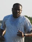 Staff Sgt. Lawrence Kelley, 919th Logistics Readiness Squadron, stays focused as he closes in on the finish of the 1.5 mile run July 12 at the squadron’s PT testing during Duke Field's UTA weekend.  919th LRS and the 919th Services Flight began early at 7 a.m. for the testing.  LRS members complete a PT test self-assessment once a quarter.  New Air Force guidance on PT testing was released in June to take effect in 2010.  Some of the new changes include biannual testing and more points awarded to the run time.  (U.S. Air Force photo/Staff Sgt. Samuel King Jr.)