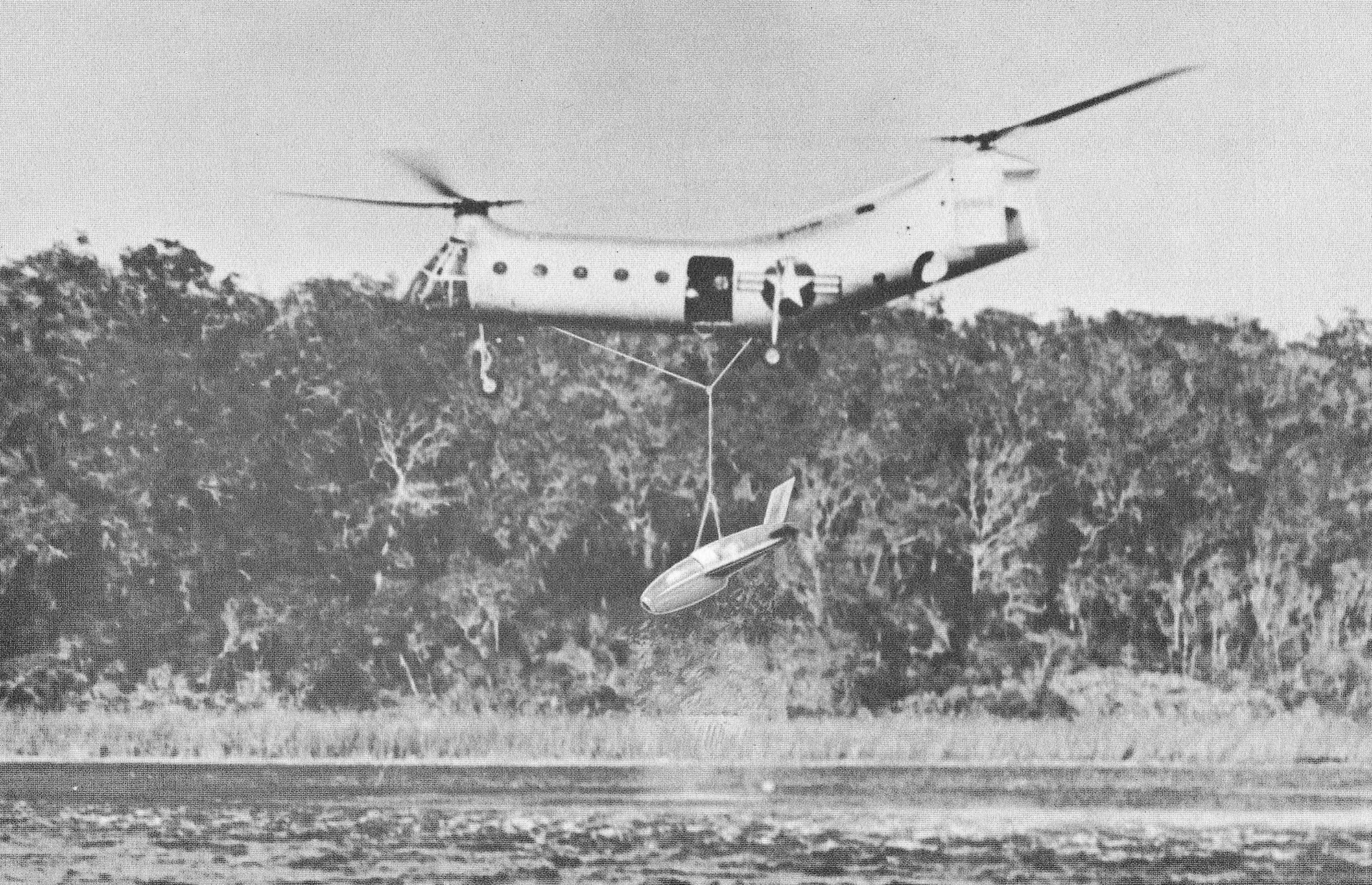 A helicopter retrieves the Firebee, which will be readied for a new mission. (Photo courtesy the New Mexico Museum of Space History archives/Ryan Aeronautical Company)