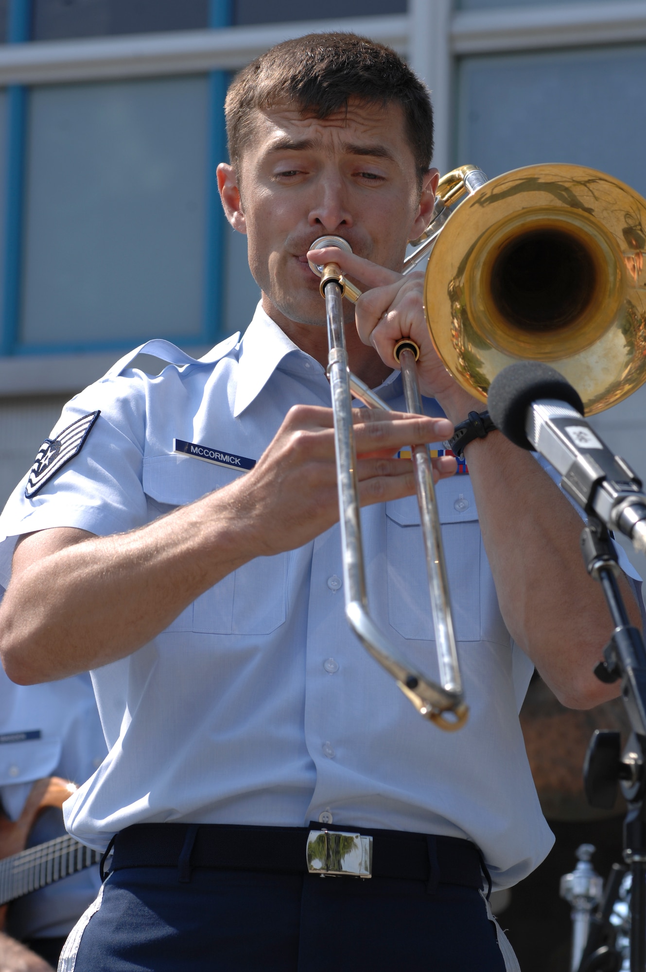 ANCHORAGE, Alaska -- Tech. Sgt. David McCormick performs his solo during the closing performances of the Sunday in the Park concert in Anchorage's Town Square July 12. McCormick is a member of the U.S. Air Force Band of the Pacific's Greatlanders. (U.S. Air Force photo/Senior Airman David Carbajal)