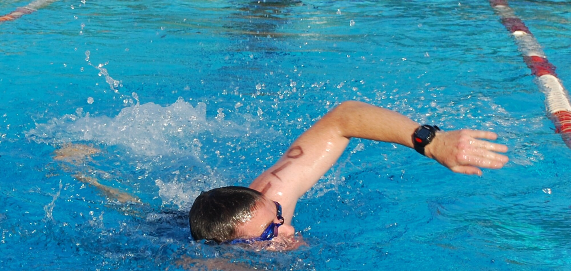 Mark Roberts swims his second out of seven laps for the swimming portion of the Fifth Annual Mini Triathlon at Sheppard July 11 at the main pool. Roberts was the 2009 39 years and Under Male champion. (U.S. Air Force photo/Airman 1st Class Valerie Hosea)
