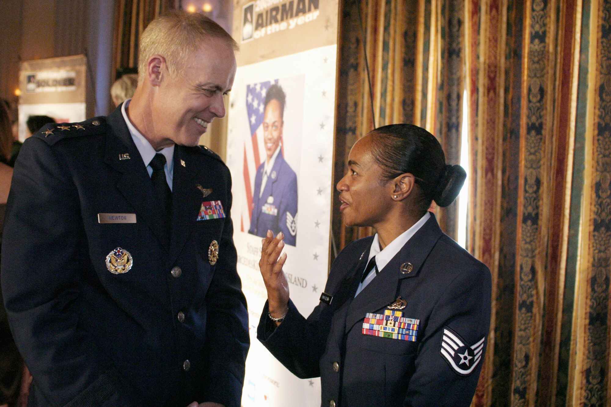 Lt. Gen. Richard Y. Newton III, the Air Force deputy chief of staff for manpower, personnel and services, joined civilian and military dignitaries in recognizing service members chosen by Army Times Publishing Company and other corporate sponsors for their Service Members of the Year awards. Staff Sgt. MercedesKimble L. Crossland earned the 2009 Air Force Times Airman of the Year award, attending the ceremony July 9 on Capitol Hill. (U.S. Air Force photo/Master Sgt. Paul Dean)
