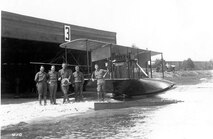 Second flying boat in Army, 1914. Included in group are Oscar Brindley, instructor; R. V. Morris, Curtiss test pilot; and Capts. J. C. Morrow and L. E. Goodier (latter at right)